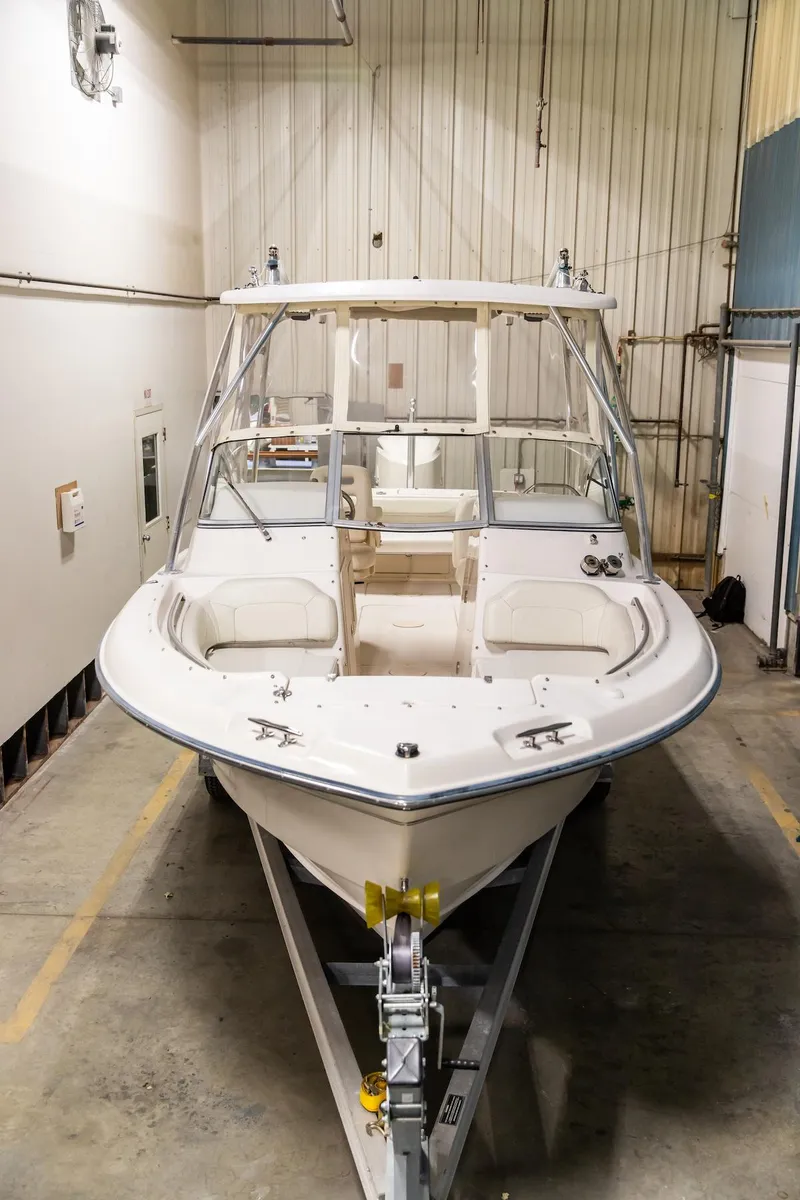 Slide: The Image of 2011 Grady-White Tournament 225 boat in indoor storage facility. - 7