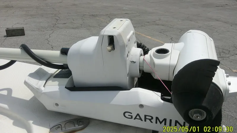 Slide: The Image of Trolling motor on a 2023 Mako 18 LTS boat with Garmin equipment. - 23