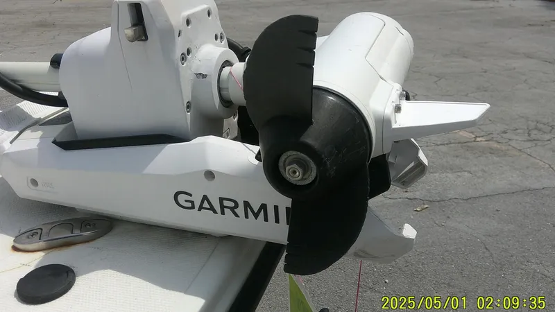 Slide: The Image of Close-up of a Garmin boat motor on a 2023 Mako 18 LTS. - 24