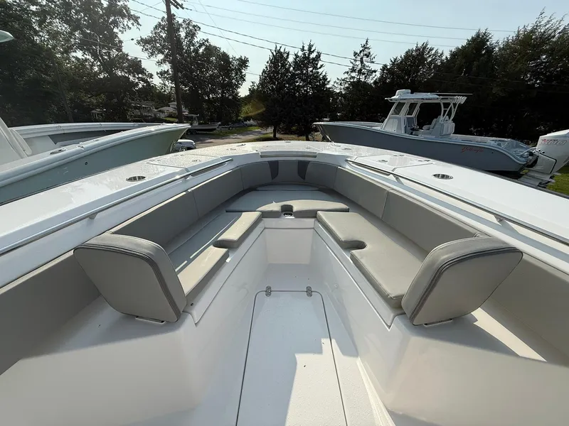 Slide: The Image of 2025 Cape Horn 32 XS boat with spacious seating and sleek design. - 16