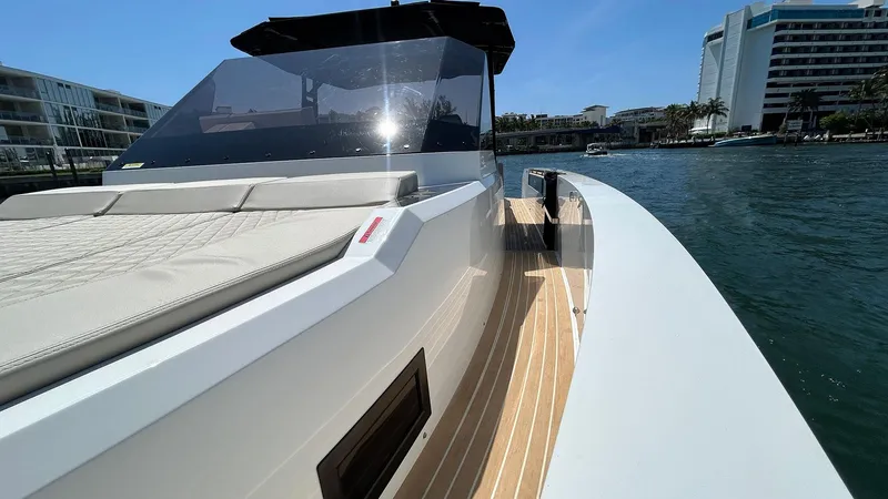 Slide: The Image of 2025 De Antonio Yachts D36 on water, showcasing sleek design and modern features. - 12