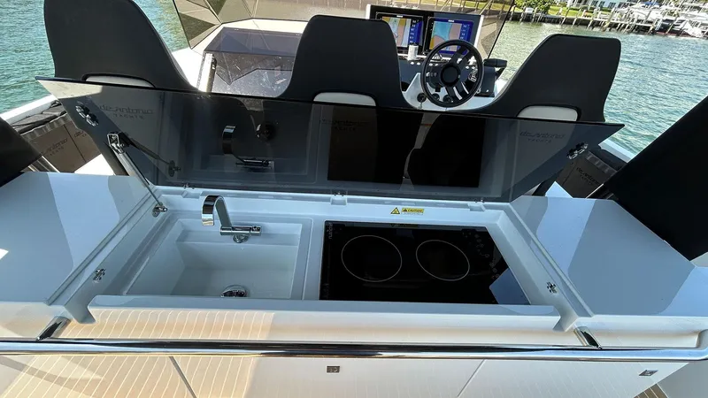 Slide: The Image of Outdoor kitchen on 2025 De Antonio Yachts D36, featuring sink and stove. - 19