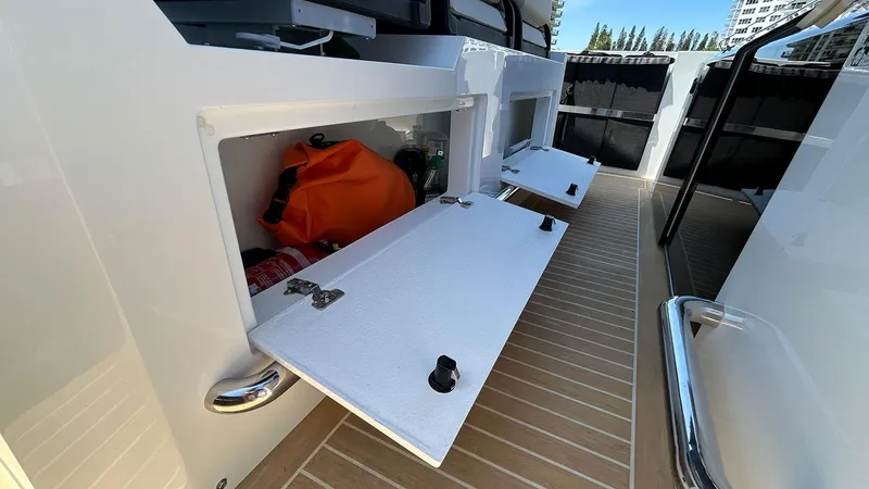 Slide: The Image of 2025 De Antonio Yachts D36 storage compartments on deck with open hatches. - 20