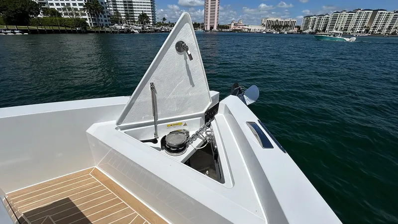 Slide: The Image of 2025 De Antonio Yachts D36 anchor compartment with scenic waterfront view. - 22