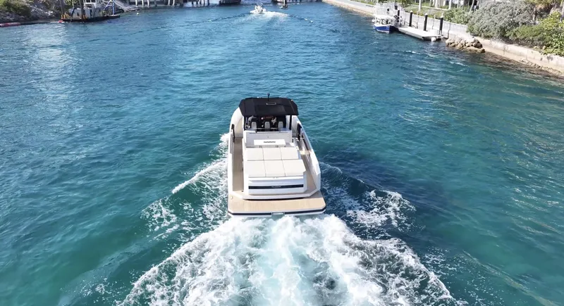Slide: The Image of 2025 De Antonio Yachts D36 cruising on clear blue water. - 4