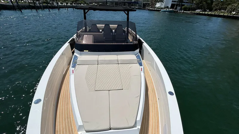 Slide: The Image of 2025 De Antonio Yachts D36 with spacious deck and luxurious seating on the water. - 9