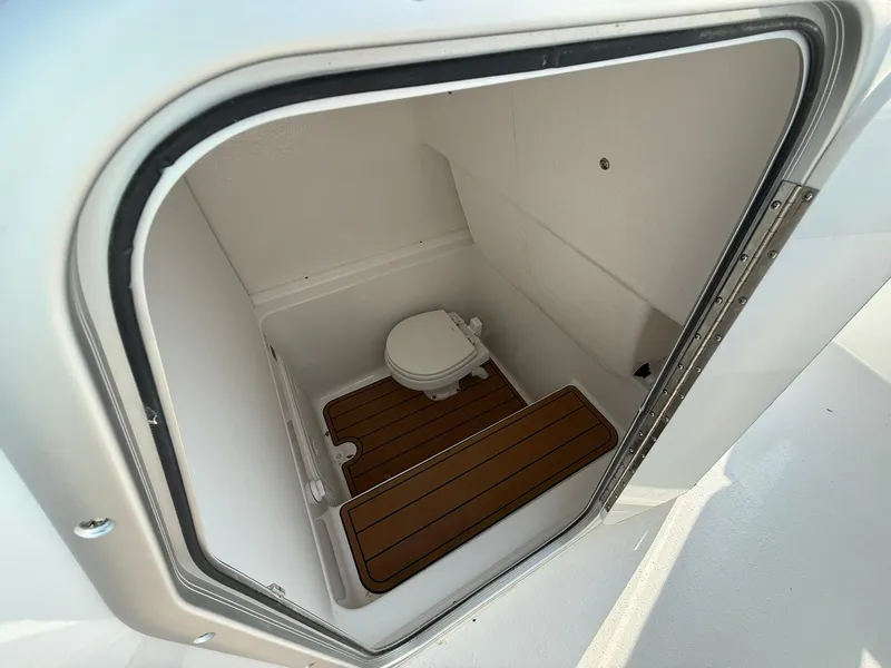 Slide: The Image of Interior of 2025 Cape Horn 32 XS boat with compact marine toilet. - 15