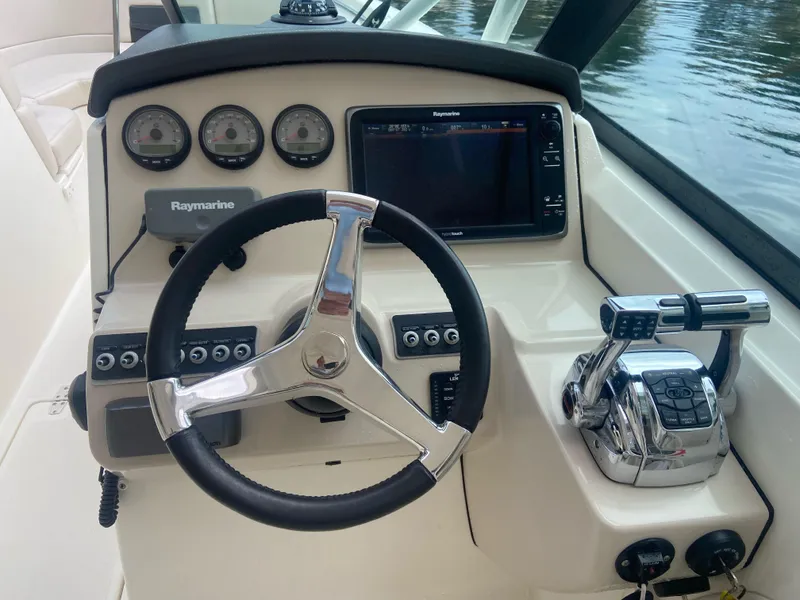 Slide: The Image of Steering console of 2013 Boston Whaler 270 Vantage with Raymarine electronics. - 10