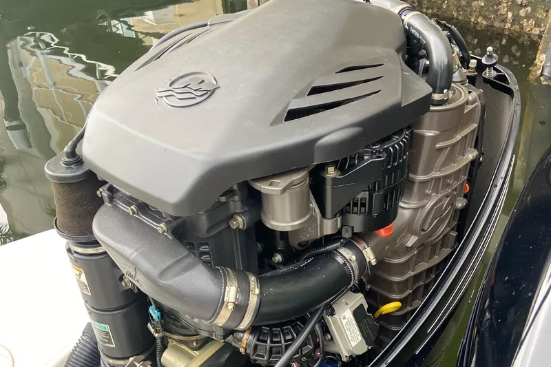Slide: The Image of Engine of a 2013 Boston Whaler 270 Vantage boat, close-up view. - 17