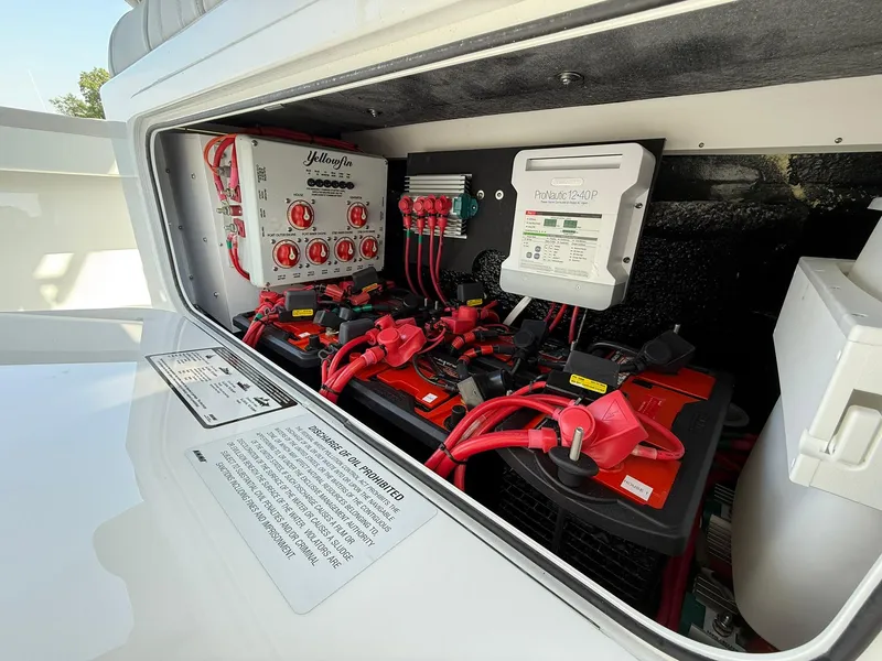 Slide: The Image of Electrical system of 2025 Yellowfin 39 Offshore boat, featuring batteries and wiring components. - 17
