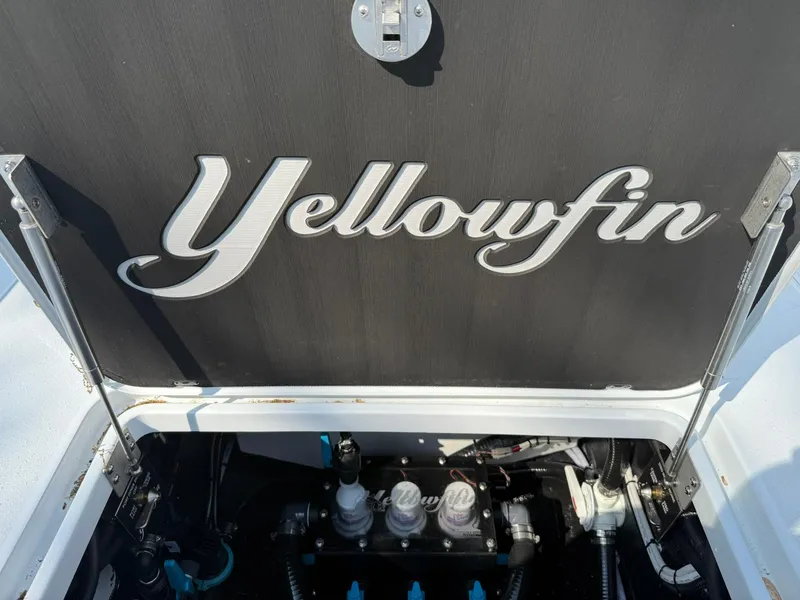 Slide: The Image of 2025 Yellowfin 39 Offshore boat engine compartment with logo visible. - 20