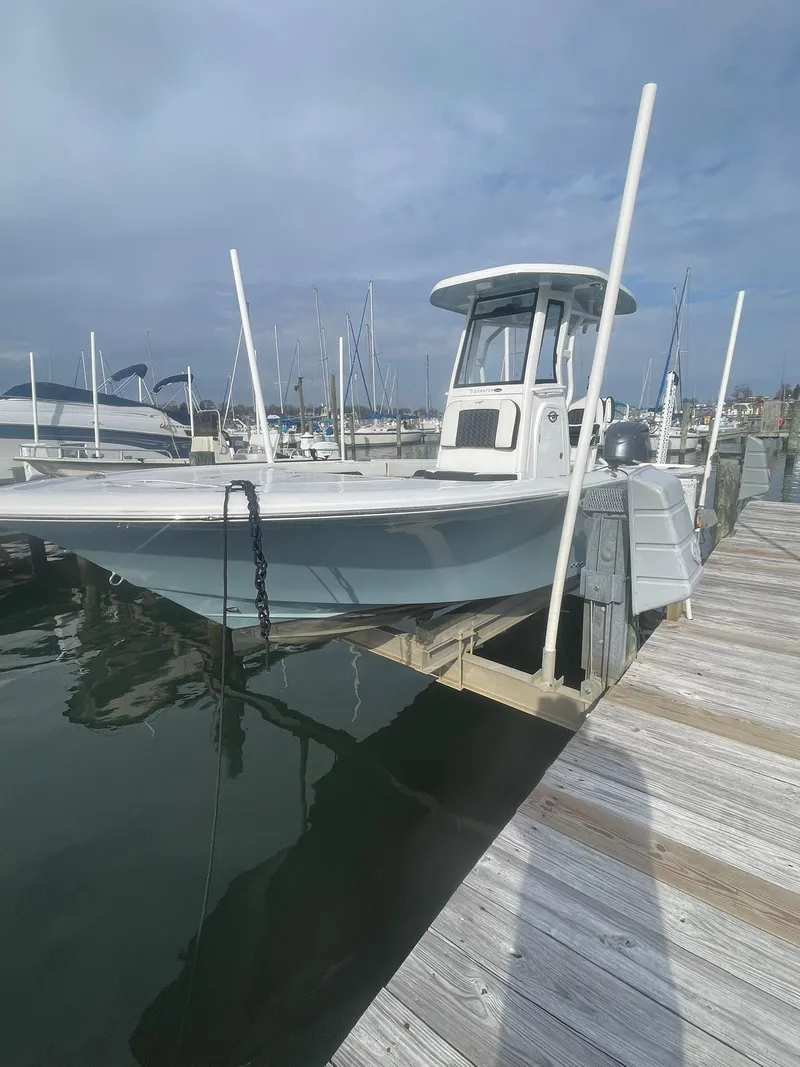 Slide: The Image of 2024 Tidewater 2500 Carolina Bay boat seats at marina, showcasing modern design and comfort. - 9