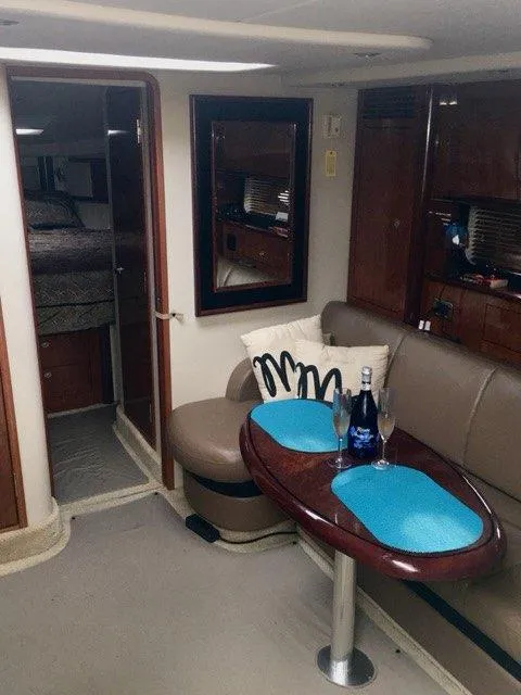 Slide: The Image of 2004 Sea Ray 390 Sundancer bathroom with shower and window. - 14