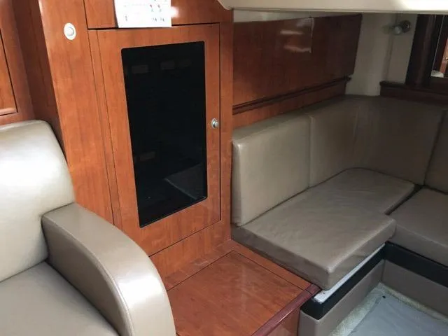 Slide: The Image of Compact bathroom in 2004 Sea Ray 390 Sundancer yacht with sink and toilet. - 25