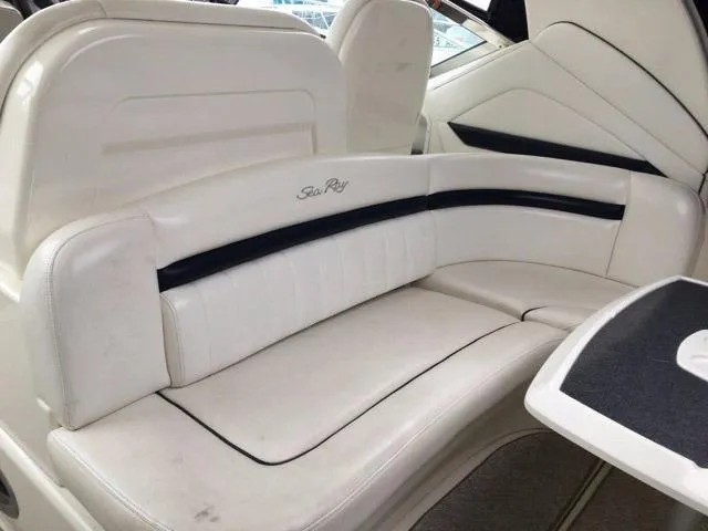 Slide: The Image of Engine compartment of a 2004 Sea Ray 390 Sundancer, featuring twin inboard engines. - 39