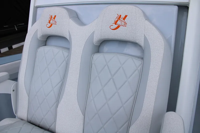Slide: The Image of 2024 Yellowfin 36 Offshore boat seats with diamond stitching and embroidered logo. - 14
