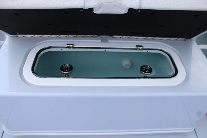 Slide: The Image of 2024 Yellowfin 36 Offshore livewell with open lid, showcasing interior design. - 21