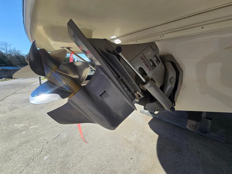 Slide: The Image of 2005 Four Winns 234 Funship boat propeller and outdrive close-up. - 14