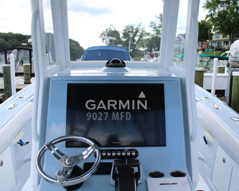 Slide: The Image of 2024 Yellowfin 36 Offshore boat with Garmin 9027 MFD display at helm. - 4