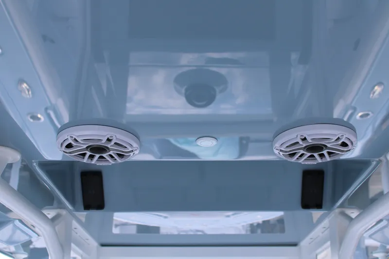 Slide: The Image of 2024 Yellowfin 36 Offshore boat ceiling with speakers and lighting fixtures. - 8