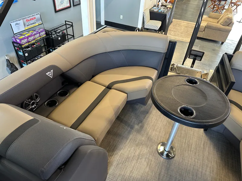 Slide: The Image of Luxurious Viaggio Lago X-U 2025 boat interior with plush seating and round table. - 12