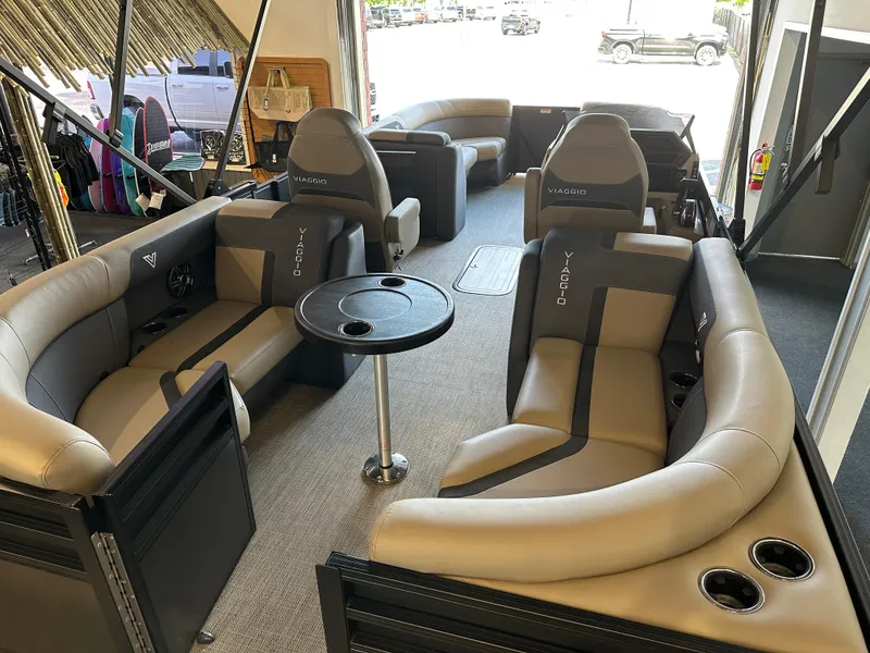 Slide: The Image of Luxurious 2025 Viaggio Lago X-U boat interior with plush seating and central table. - 14