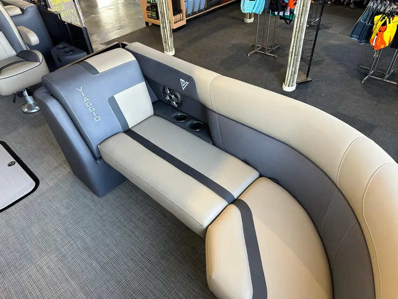 Slide: The Image of Luxurious seating in 2025 Viaggio Lago X-U boat, featuring sleek gray upholstery and cup holders. - 9