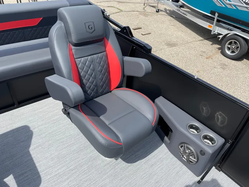 Slide: The Image of 2025 Godfrey SW2286SFLC Tritoon interior with modern seating and sleek design. - 10
