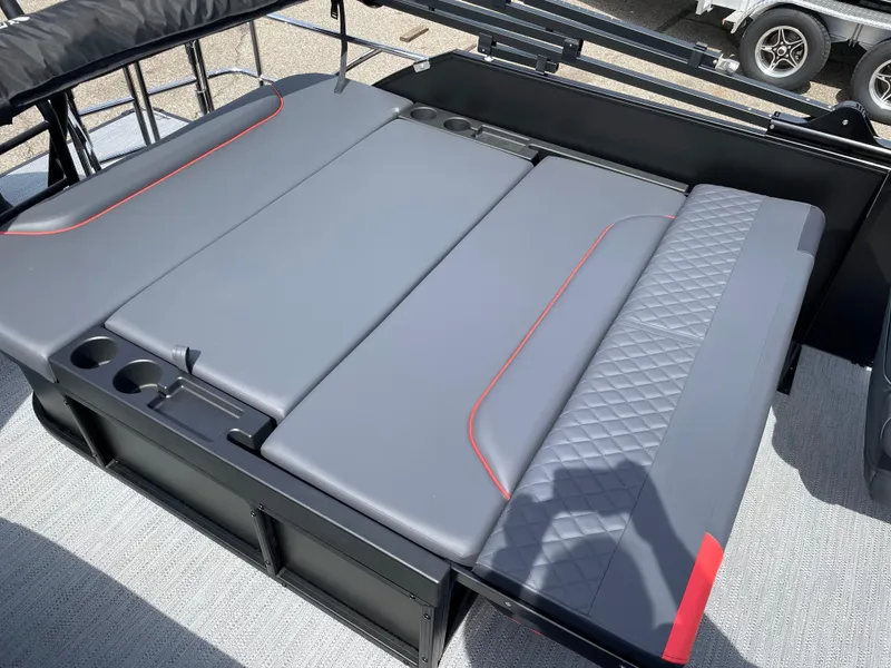 Slide: The Image of Steering console of 2025 Godfrey SW2286SFLC Tritoon with gauges and controls. - 13