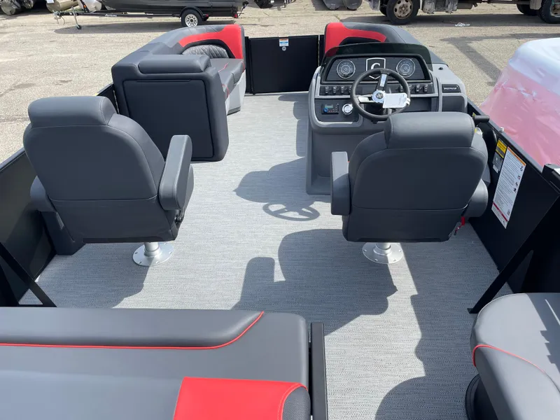 Slide: The Image of Control panel of 2025 Godfrey SW2286SFLC Tritoon with switches and Clarion audio system. - 14