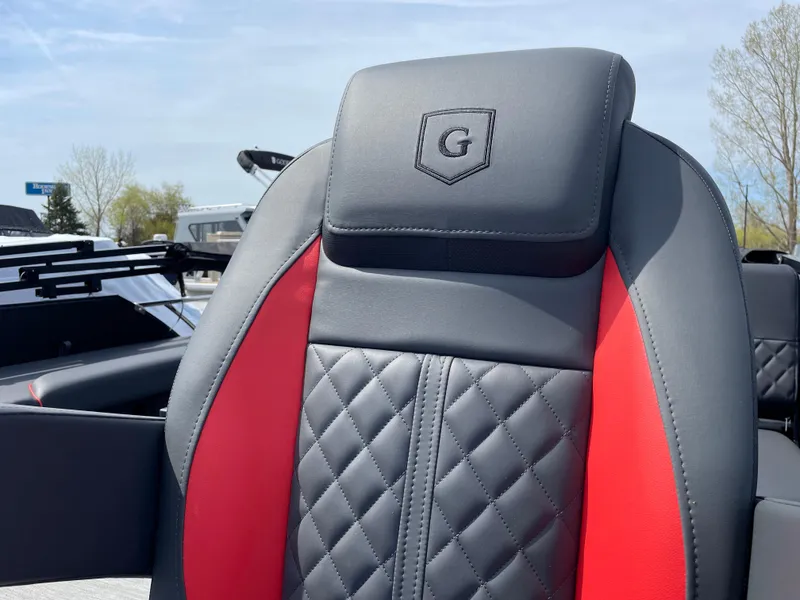 Slide: The Image of Luxurious seating on 2025 Godfrey SW2286SFLC Tritoon with quilted design and red accents. - 25