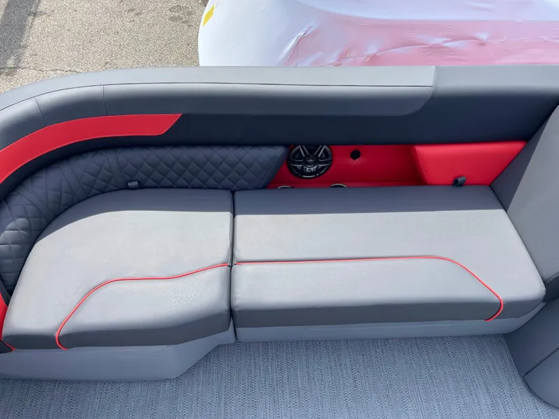 Slide: The Image of 2025 Godfrey SW2286SFLC Tritoon boat on trailer outside dealership. - 3