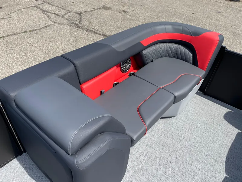 Slide: The Image of 2025 Godfrey SW2286SFLC Tritoon, red and black, parked outdoors on a sunny day. - 4