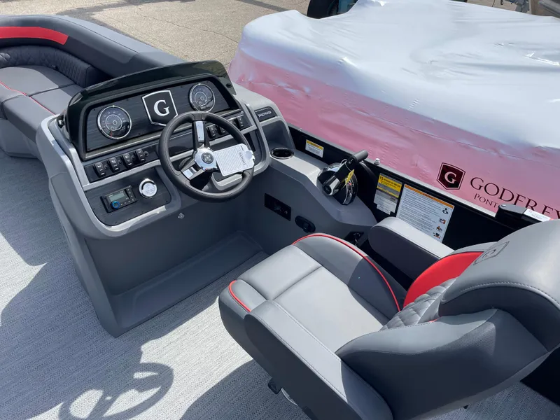 Slide: The Image of 2025 Godfrey SW2286SFLC Tritoon with modern seating and sleek design. - 6