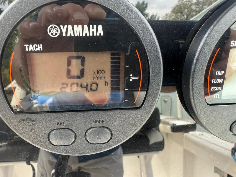 Slide: The Image of Yamaha tachometer display on 2021 Tidewater 220 CC boat showing 2040 hours. - 4