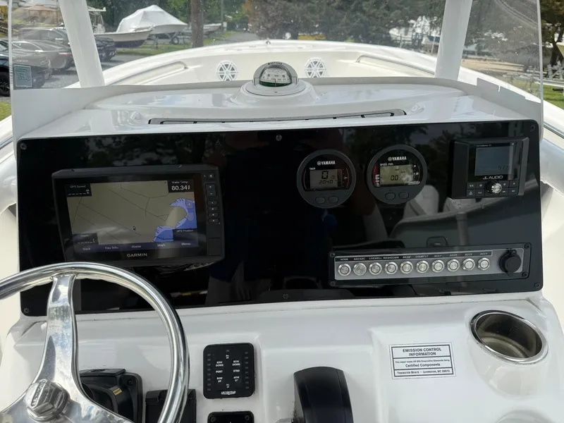 Slide: The Image of Control panel of a 2021 Tidewater 220 CC boat with navigation instruments. - 5