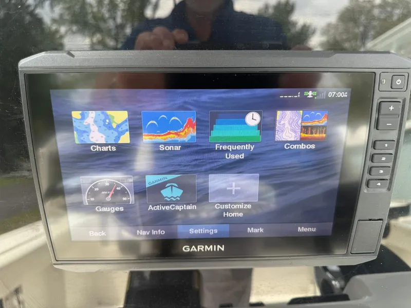 Slide: The Image of Garmin marine display on 2021 Tidewater 220 CC, showing navigation and sonar options. - 7