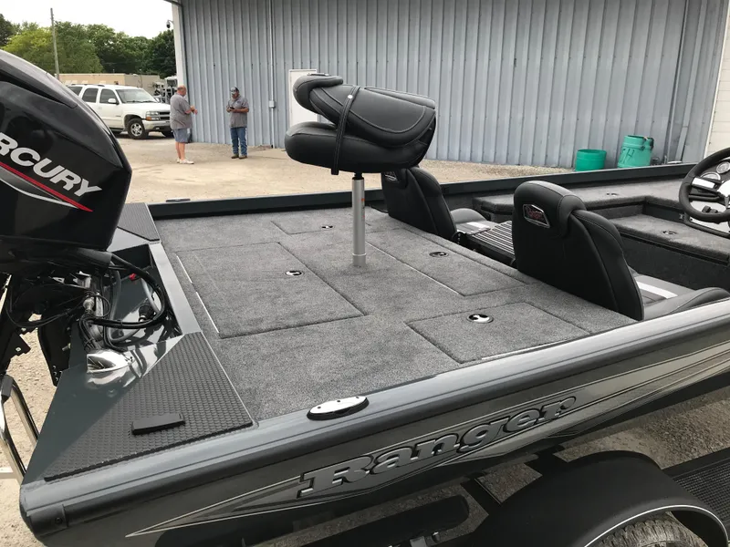 Slide: The Image of 2025 Ranger RT178 fishing boat with Mercury engine, featuring spacious deck and seating. - 10