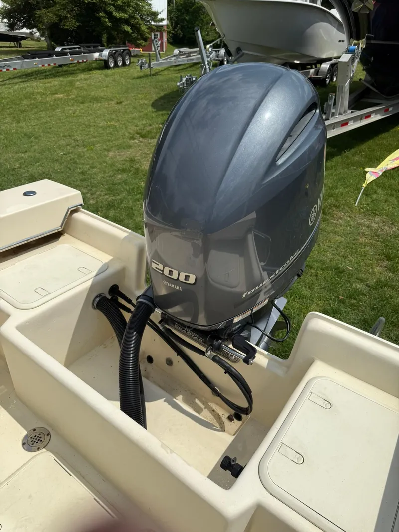 Slide: The Image of 2020 Jones Brothers 23 Cape Fisherman Lite Tackle boat with 200 HP outboard motor. - 15