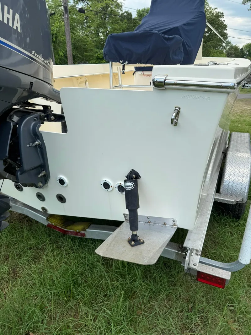 Slide: The Image of 2020 Jones Brothers 23 Cape Fisherman Lite Tackle boat on trailer, featuring Yamaha engine. - 21