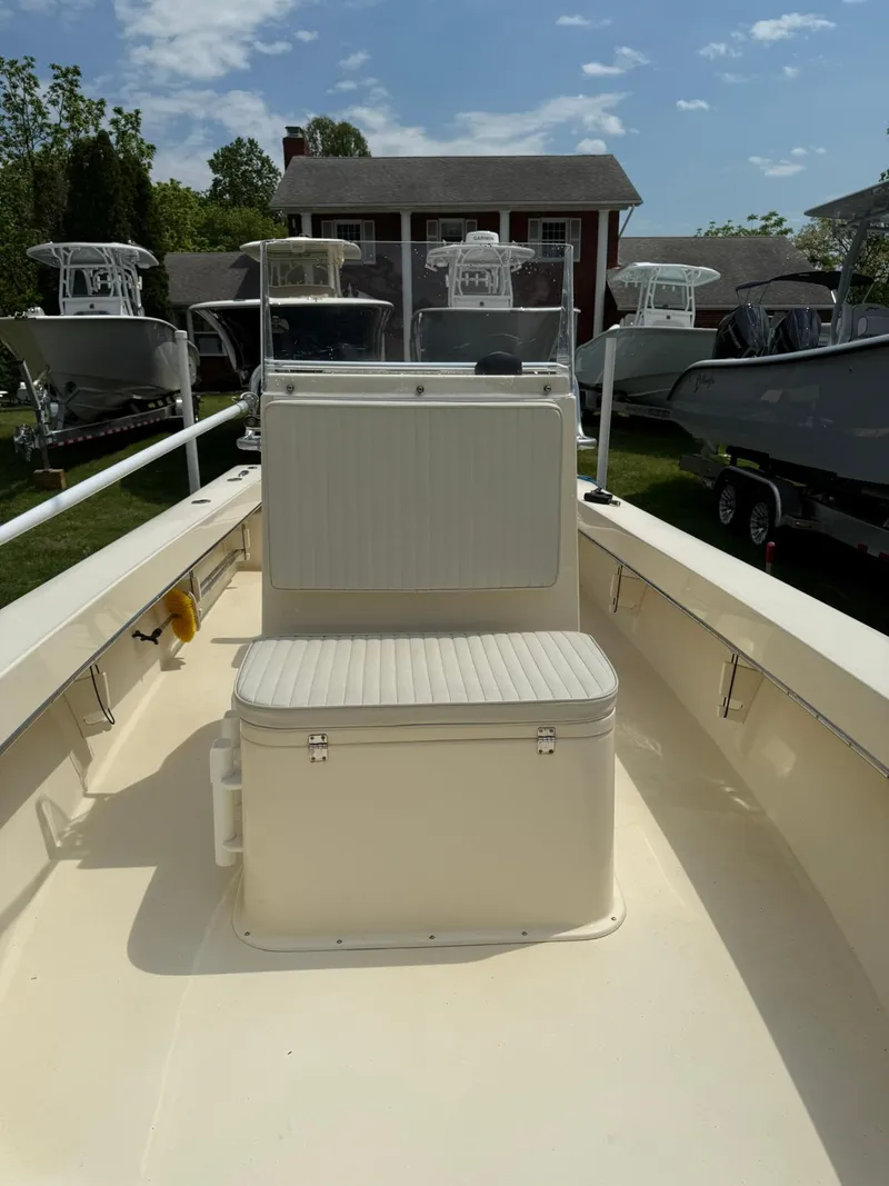 Slide: The Image of 2020 Jones Brothers 23 Cape Fisherman Lite Tackle boat, interior view, sunny day. - 9