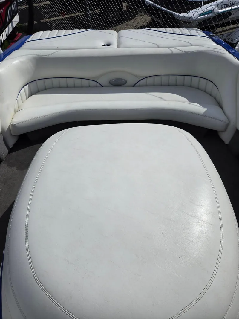 Slide: The Image of 2005 Malibu Response LXi boat interior with white leather seating. - 15