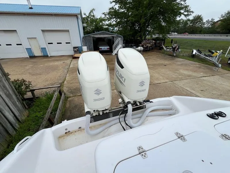 Slide: The Image of Twin Suzuki 300 outboard engines on a 2000 Donzi 35 ZF Daytona boat. - 15
