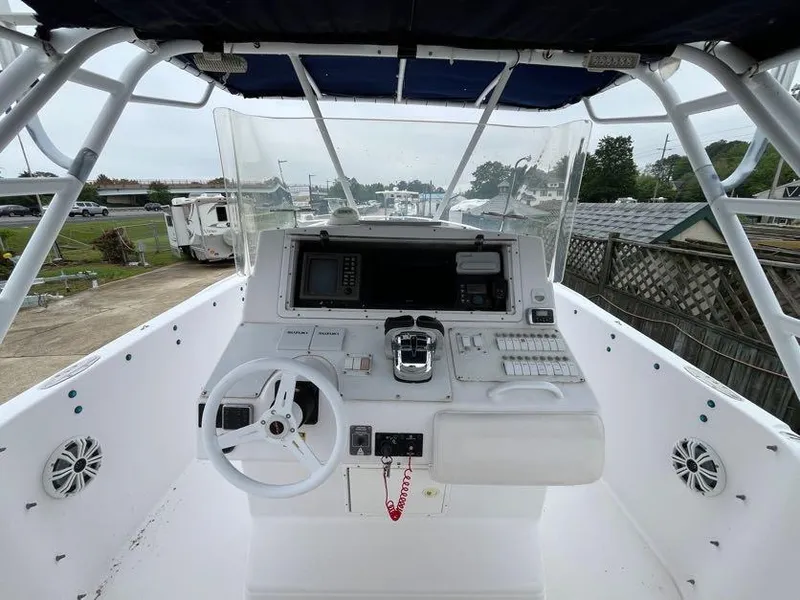 Slide: The Image of Cockpit of 2000 Donzi 35 ZF Daytona boat with steering wheel and control panel. - 3