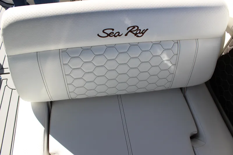 Slide: The Image of 2020 Sea Ray SDX 270 OB boat seat with hexagonal pattern and logo. - 26