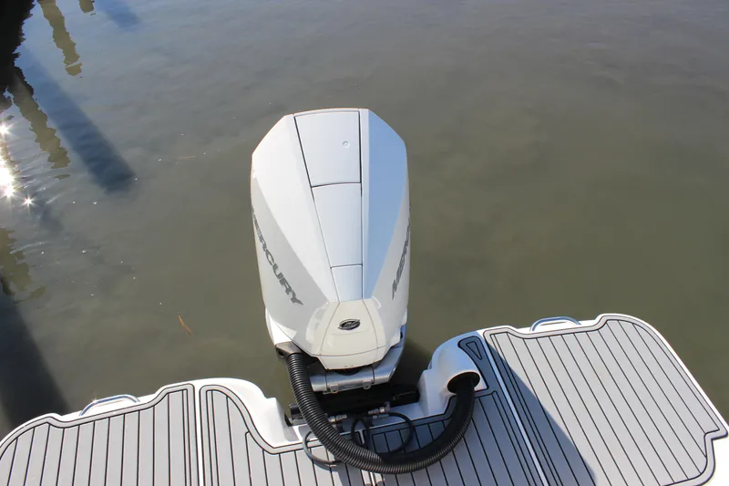 Slide: The Image of 2020 Sea Ray SDX 270 OB boat with outboard motor on water. - 30