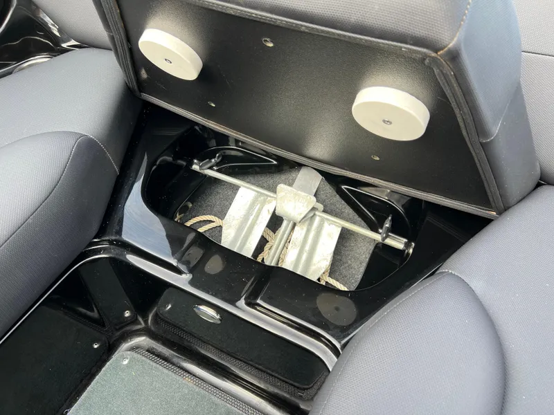 Slide: The Image of 2020 MasterCraft NXT22 boat interior storage compartment with anchor and seating. - 20