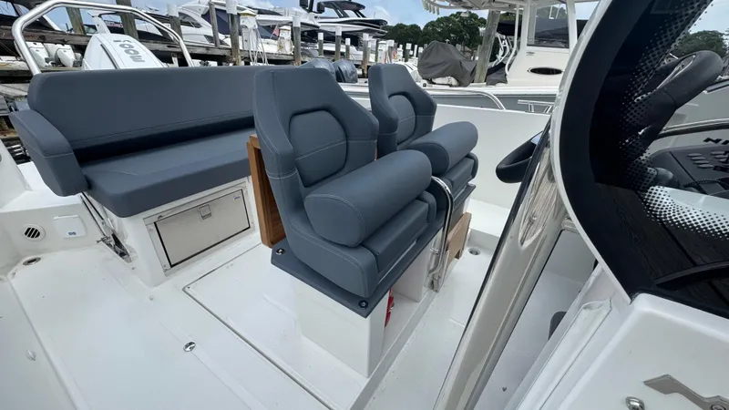 Slide: The Image of 2024 Nimbus T8 boat interior with sleek seating and modern design. - 16