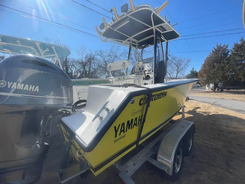 Slide: The Image of 1998 Contender 21 CC boat with Yamaha engine, repowered in 2018, on a trailer. - 11