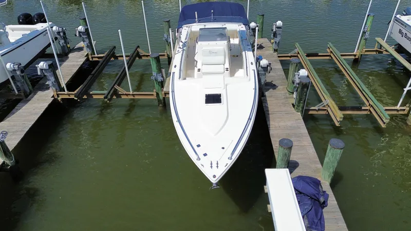 Slide: The Image of 2006 Marlago FS35 boat docked at a marina, aerial view. - 5